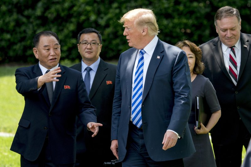 From left, former North Korean military intelligence chief Kim Yong Chol, left, President Donald Trump, and Secretary of State Mike Pompeo, right, walk from the Oval Office, on Friday, June 1, 2018, in Washington. Photo: APn