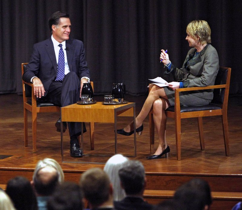 File - In this photo, former Massachusetts Gov. Mitt Romney speaks with moderator Elizabeth Brackett in Chicago on Wednesday, March 24, 2010. Photo: AP