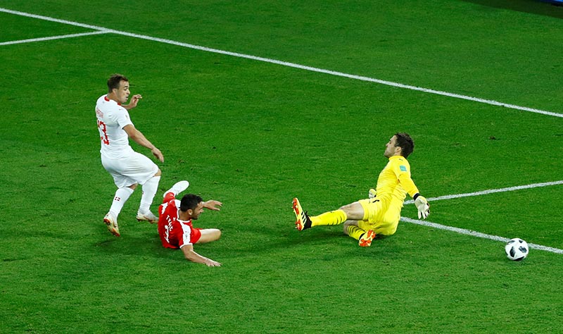 Switzerland's Xherdan Shaqiri scores their second goal against Serbia in the group stage of football world cup, in Kaliningrad Stadium, Kaliningrad, Russia, on June 22, 2018. Photo: Reuters