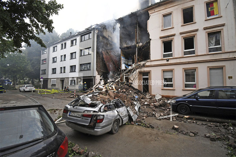 A car and a house are destroyed after an explosion in Wuppertal, Germany, June 24, 2018. Photo: AP
