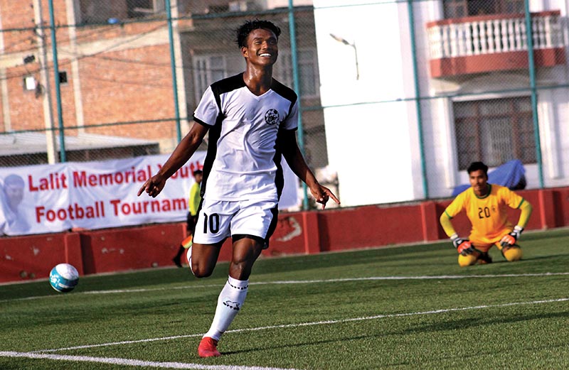 Sanjay Dhimal of Himalayan Sherpa Club celebrates after scoring a goal against Three Star Club during their Lalit Memorial U-18 Championship match in Lalitpur on Monday.