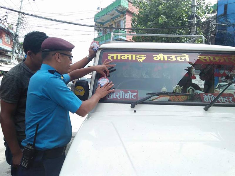 Traffic police officers participating in a traffic awareness campaign, in Besisahar, Lamjung, on Tuesday, June 19, 2018. Photo: Ramji Rana