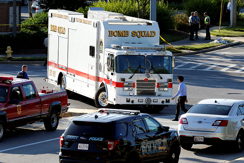 Emergency response vehicles drive near a shooting scene after a gunman opened fire at the Capital Gazette newspaper in Annapolis, Maryland, US, June 28, 2018. Photo: Reuters