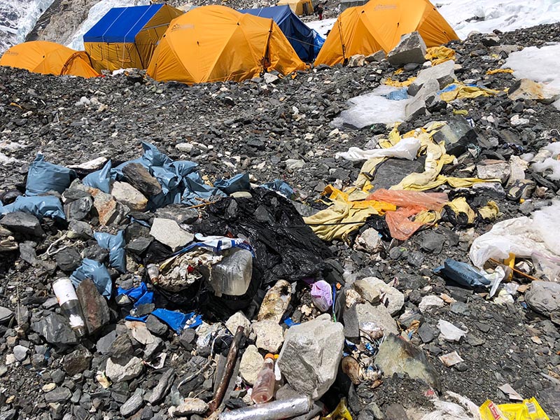 Bags full of human waste, tents and garbage left behind by climbers above Camp II on Mt Everest. Photo courtesy: David Liau00f1o