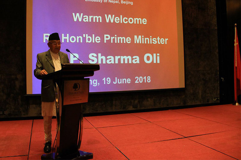 Prime Minister KP Sharma Oli addressing a reception held in his honour by the Embassy of Nepal in China, in Beijing, on Tuesday, June 19, 2018. Photo Courtesy: MoFA