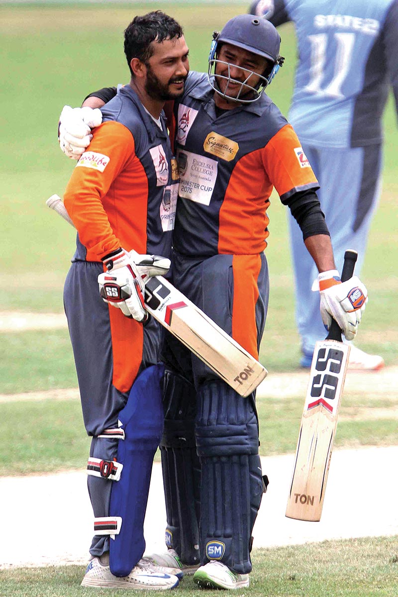 APFu2019s Pradeep Singh Airee (right) and teammate Subash Khakurel celebrate during their PM Cup match against Province2 in Kathmandu on Monday. Photo: Udipt Singh Chhetry/ THT