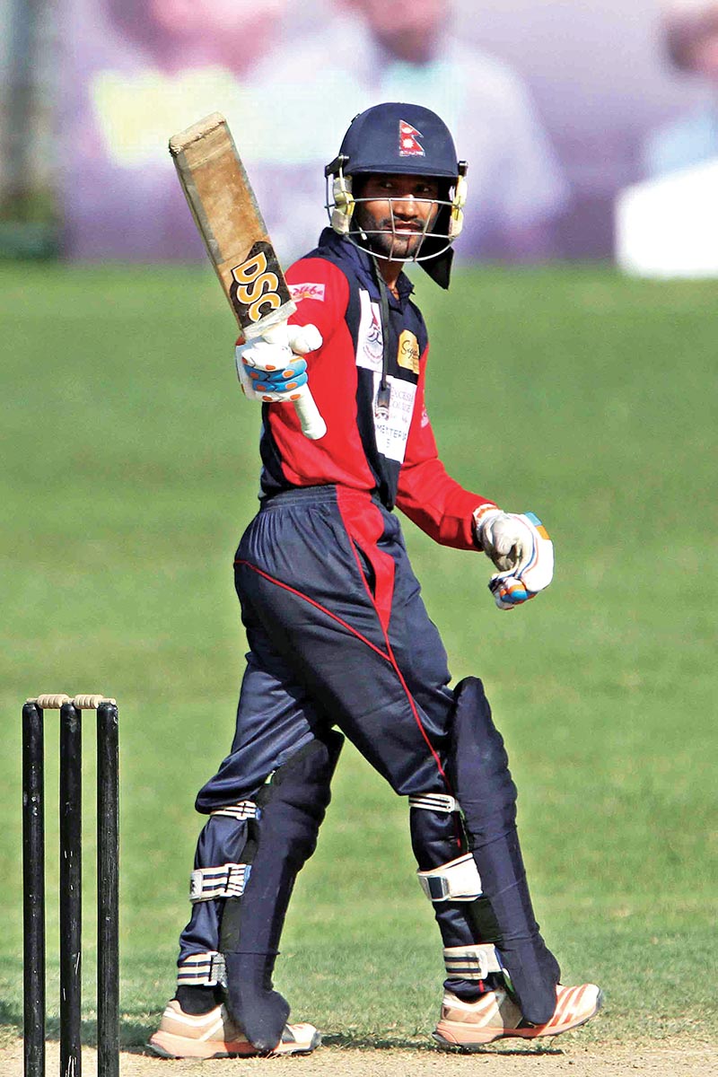 NPCu2019s Dipendra Singh Airee celebrates his half century against Province5 during their PM Cup One Day Cricket Tournament match at the TU Stadium in Kathmandu on Wednesday. Photo: Udipt Singh Chhetry/ THT