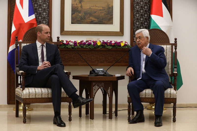 Palestinian President Mahmoud Abbas gestures during his meeting with Britain's Prince William in Ramallah, in the occupied West Bank June 27, 2018. Alaa Badarneh/Pool via Reuters