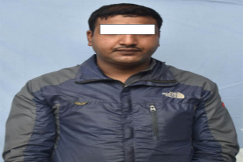 Police making public an absconding fraud convict Rajendra Prasad Luitel at the Metropolitan Police Division in Kathmandu, on Tuesday, June 05, 2018. Courtesy: MCD