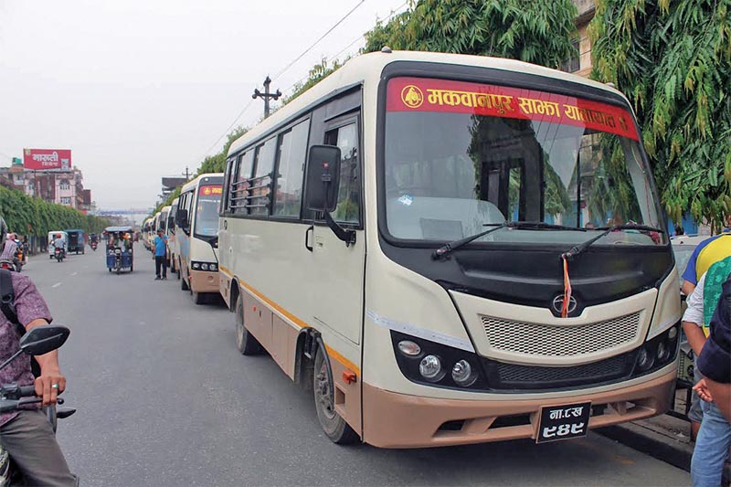 Sajha Yatayat buses parked on the roadside in Hetauda Sub-Metropolitan City, on Saturday. Photo: THT
