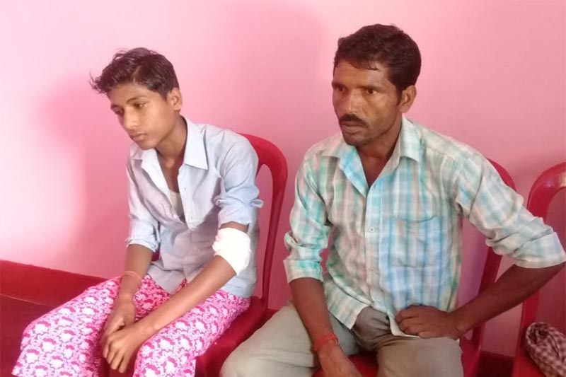 Fourteen-year-old Dharmadev Sah, (left) of Chhinamasta Rural Municipality was thrashed by Principal Binod Safi of Holy Cross Boarding School in Rajbiraj, on Monday, June 18, 2018. Photo: THT
