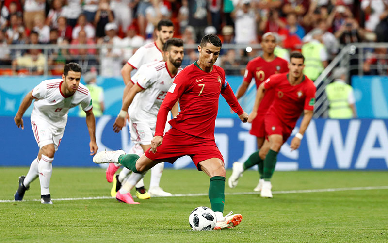 Portugal's Cristiano Ronaldo has a penalty saved by Iran's Alireza Beiranvand during the World Cup Group B match between Iran and Portugal, at Mordovia Arena, in Saransk, Russia, on June 25, 2018. Photo: Reuters