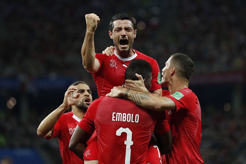 Switzerland's Blerim Dzemaili, top celebrates after scoring his side's first goal during the group E match between Switzerland and Costa Rica, at the 2018 soccer World Cup in the Nizhny Novgorod Stadium in Nizhny Novgorod , Russia, Wednesday, June 27, 2018. Photo: AP