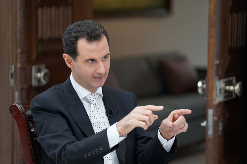 Syria's President Bashar al Assad gestures during an interview with a Greek newspaper in Damascus, Syria in this handout released May 10, 2018. SANA/Handout via Reuters   THIS IMAGE HAS BEEN SUPPLIED BY A THIRD PARTY. REUTERS IS UNABLE TO INDEPENDENTLY VERIFY THE AUTHENTICITY, CONTENT, LOCATION OR DATE OF THIS IMAGE.