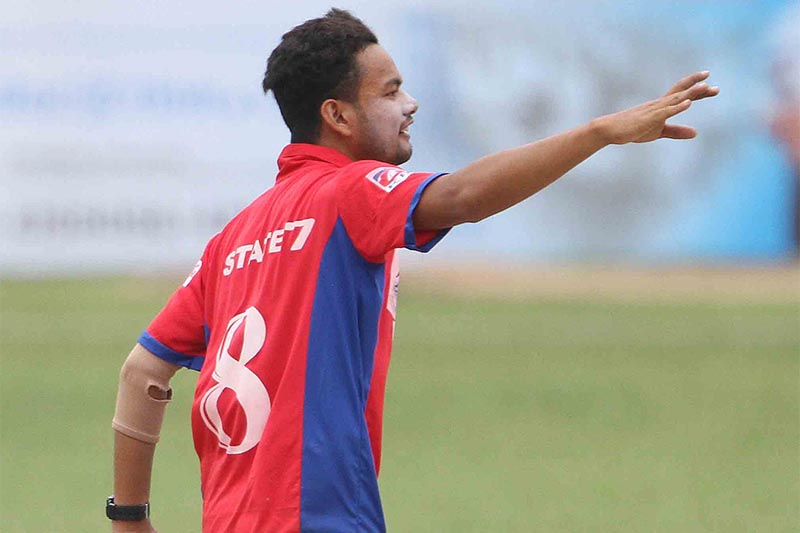Sher Malla of Province No.7 gestures to celebrate wickets against Province No.3 during the PM Cup Cricket Tournament  at TU Cricket Stadium in Kathmandu on Saturday, June 2, 2018. Photo: THT
