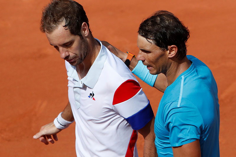 Tennis - French Open - Roland Garros, Paris, France - June 2, 2018   Spain's Rafael Nadal with France's Richard Gasquet after winning their third round match    REUTERS/Christian Hartmann