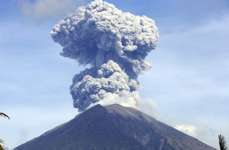 Mount Agung spews ash and smoke in Karangasem, Bali, Indonesia, on Tuesday, July 3, 2018. Photo: AP