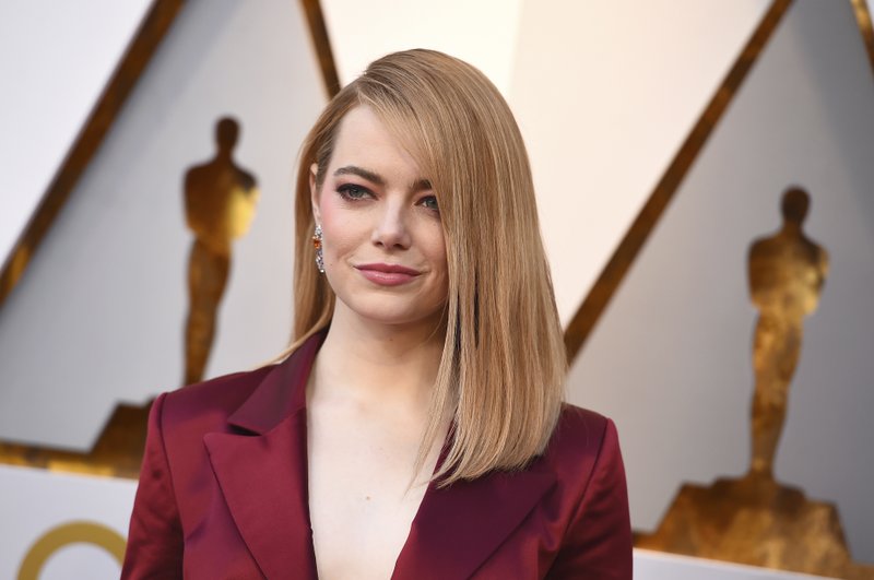 FILE - In this photo, Emma Stone arrives at the Oscars in Los Angeles on  March 4, 2018. 