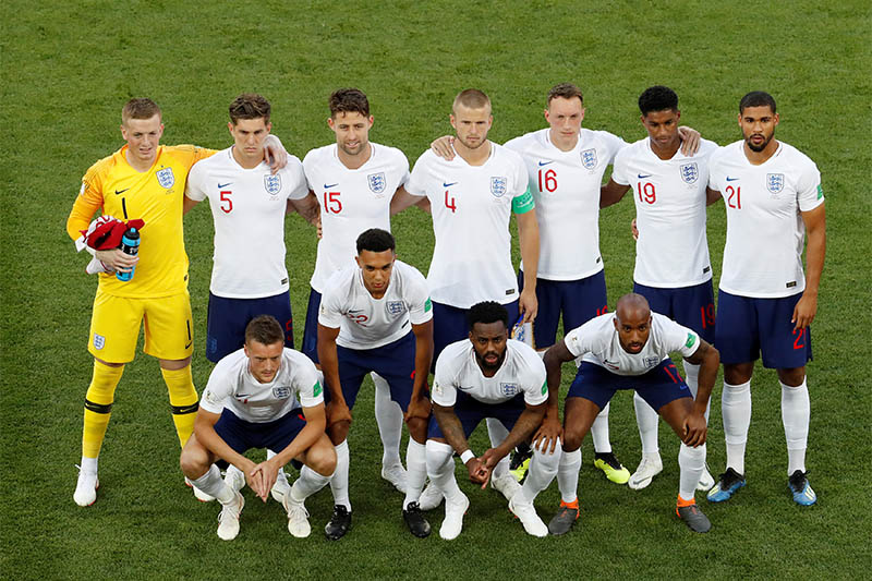 England players pose for a team group photo before the match. Photo: Reuters