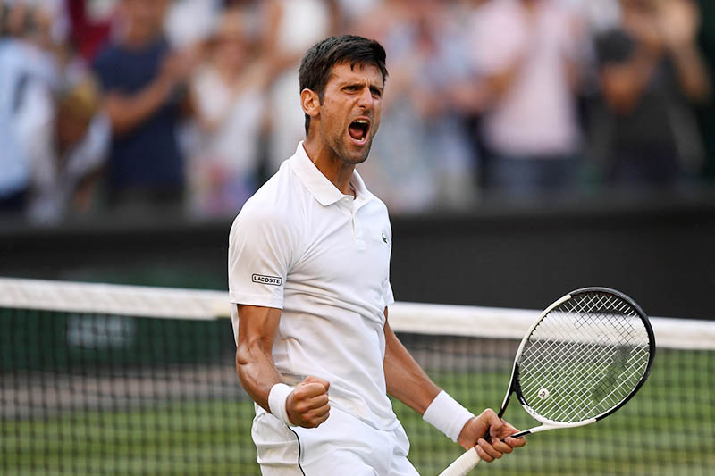 Serbia's Novak Djokovic celebrates winning the third round match against Britain's Kyle Edmund. Photo: Reuters