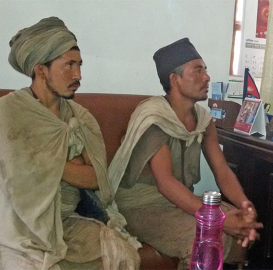 Two members of tribal Raute community, who arrived in Chitwan in the run-up of the Dashain festival, call on Chitwan Chief District Officer Binod Prakash Singh, in Bharatpur on Wednesday, October 14, 2015. Photo: Tilak Ram Rimal