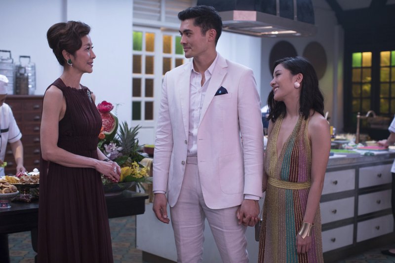 This image released by Warner Bros. Entertainment shows Michelle Yeoh, from left, Henry Golding and Constance Wu in a scene from the film u201cCrazy Rich Asians.u201d Photo: AP