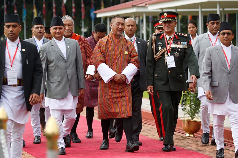 Bhutanu2019s Chief Justice and Chief Advisor to the Interim Government Dasho Tshering Wangchuk (centre) arrives at Tribhuvan International Airport to attend the Bay of Bengal Initiative for Multi-Sectoral Technical and Economic Cooperation (BIMSTEC) summit in Kathmandu, on August 29, 2018. Photo: Reuters
