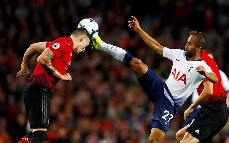 Tottenham's Lucas Moura in action with Manchester United's Phil Jones during Premier League match between Manchester United and Tottenham Hotspur, at Old Trafford, in Manchester, Britain, on August 27, 2018. Photo: Action Images via Reuters
