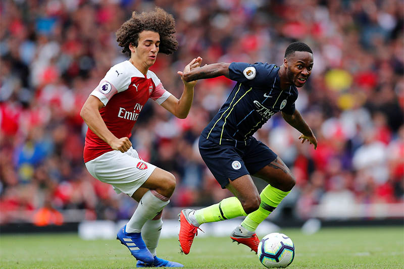 Arsenal's Matteo Guendouzi in action with Manchester Cityu2019s Raheem Sterling. Photo: Reuters