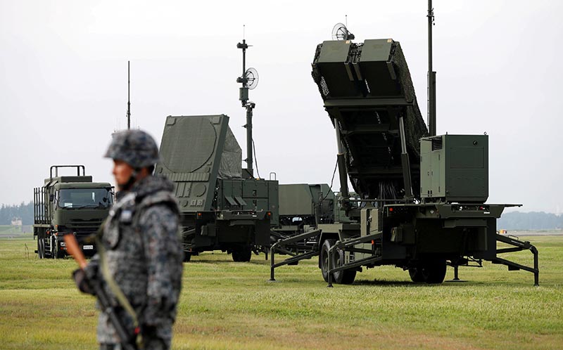 A Japan Self-Defense Forces (JSDF) soldier takes part in a drill to mobilise their Patriot Advanced Capability-3 (PAC-3) missile unit at US Air Force Yokota Air Base in Fussa on the outskirts of Tokyo, Japan August 29, 2017. Photo: Reuters/ File