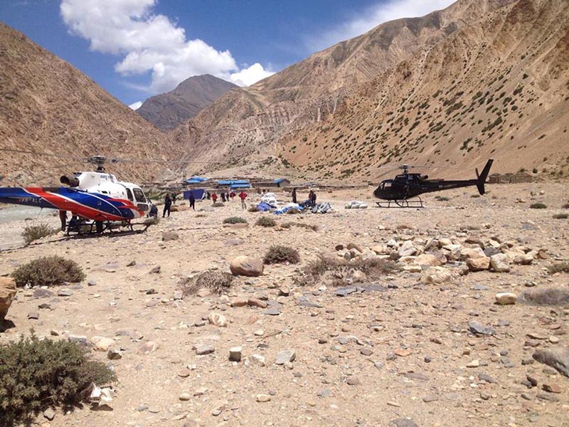 File - This undated image shows Manang Air choppers at Hilsa in Namkha Rural Municipality of Humla district. An Indian national on a pilgrimage to Manasarovar in Tibet was killed on the spot when he was struck by one of the helicopters' rotor blades on August 14, 2018. Photo: Manang Air Facebook