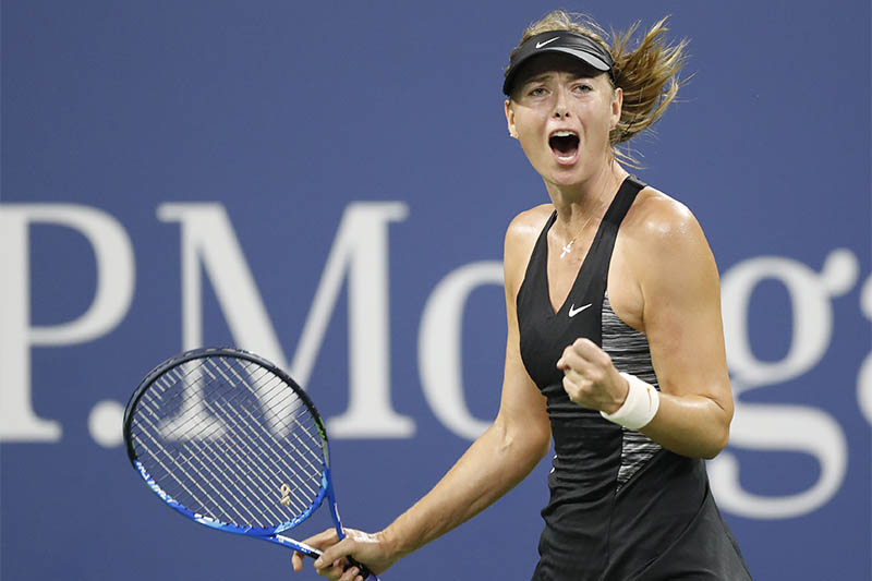 Maria Sharapova of Russia celebrates after winning a point in the first set of a first round match against Patty Schnyder of Switzerland on day two of the 2018 U.S. Open tennis tournament at USTA Billie Jean King National Tennis Center. Mandatory Credit: Jerry Lai-USA TODAY Sports
