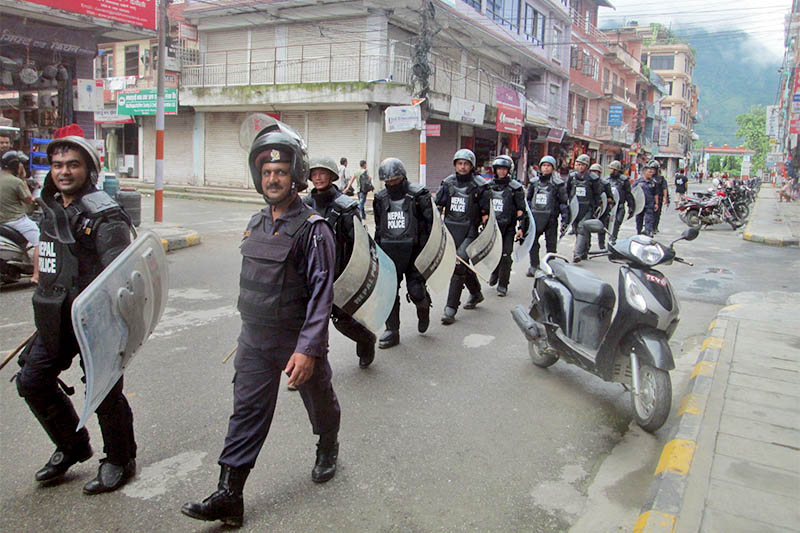 Police personnel returning to their base after regular drill in Tanahun district, on Monday, August 06, 2018. Photo: Madan Wagle
