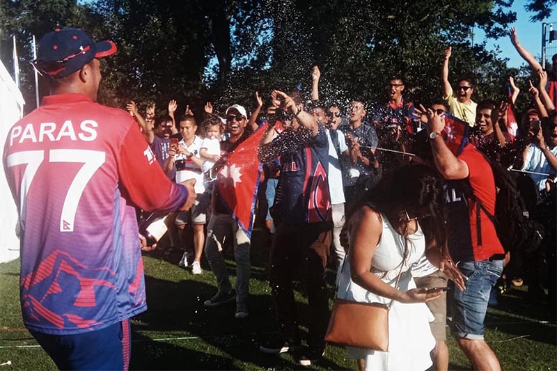 Nepal skipper Paras Khadka sprays champagne to fans after the teamu2019s one-run victory over the Netherlands in their second One Day International match at the VRA Ground in Amstelveen, on Friday, August 3, 2018. Photo: ICC