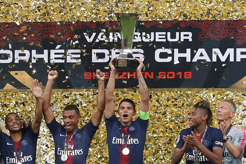 Soccer Football - French Super Cup Trophee des Champions - Paris St Germain v AS Monaco - Shenzhen Universiade Sports Centre, Shenzhen, China - August 4, 2018   Paris St Germain's Thiago Silva celebrates with the trophy and team mates after winning the French Super Cup Photo:  REUTERS