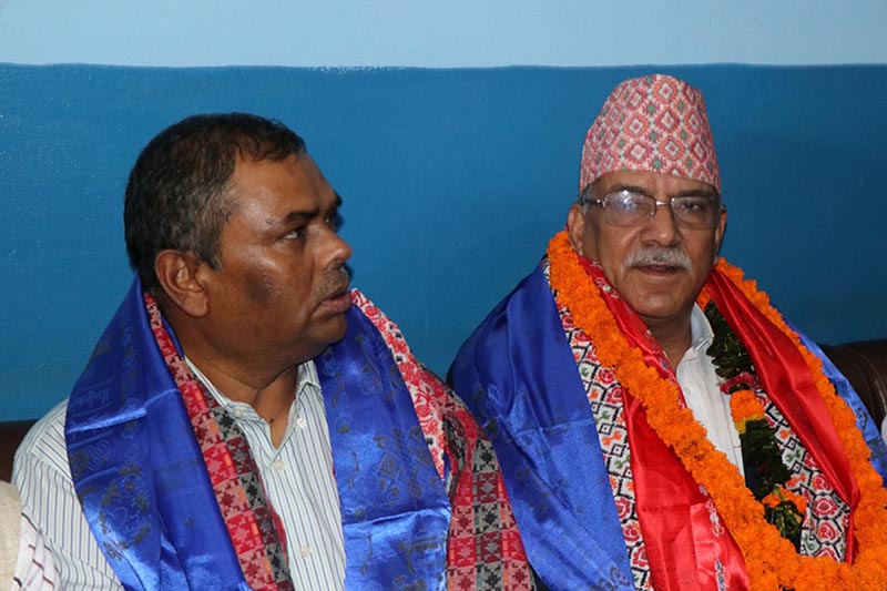 Nepal Communist Party (NCP) Co-chair Pushpa Kamal Dahal (right) and Minister for Health and Population Upendra Yadav attend a joint press meet organised by Press Chautari Nepal and Press Centre Nepal at Bharatpur airport, in Chitwan district, on Saturday, August 11, 2018. Photo: RSS