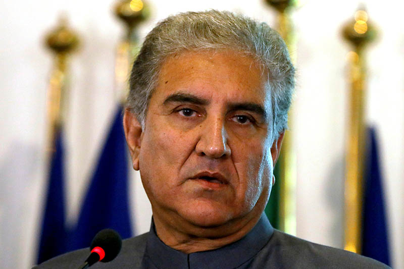 FILE PHOTO: Pakistan's new Foreign Minister Shah Mehmood Qureshi listens during a news conference at the Foreign Ministry in Islamabad, Pakistan August 20, 2018. Photo: Reuters