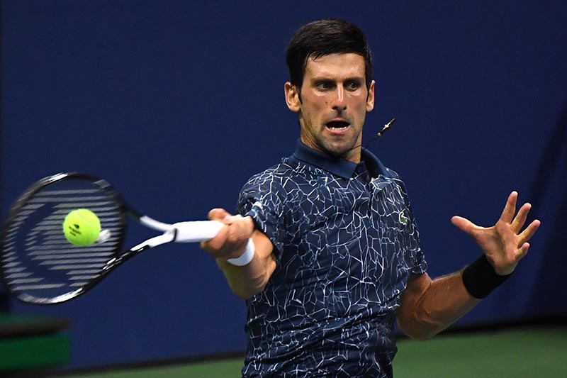 Novak Djokovic of Serbia hits to Tennys Sandgren of the United States in a second round match on day four of the 2018 US Open tennis tournament at USTA Billie Jean King National Tennis Center, in New York, NY, USA, on Aug 30, 2018. Photo: Danielle Parhizkaran-USA TODAY SPORTS via Reuters