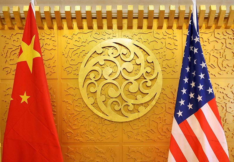 Chinese and US flags are set up for a meeting during a visit by US Secretary of Transportation Elaine Chao at China's Ministry of Transport in Beijing, China, on April 27, 2018. Photo: Reuters