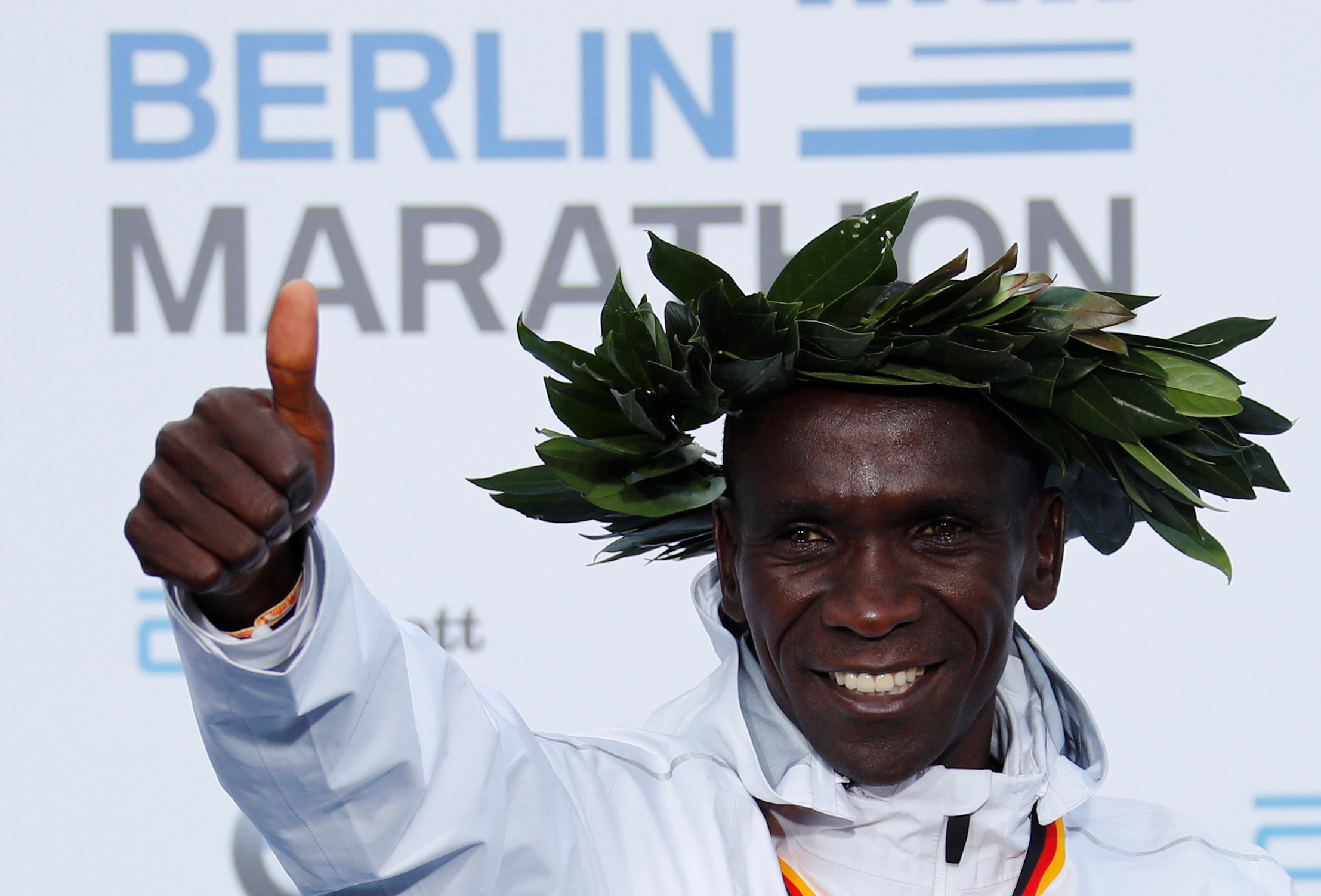 Athletics - Berlin Marathon - Berlin, Germany - September 16, 2018   Kenya's Eliud Kipchoge celebrates after winning the Berlin Marathon and breaking the World Record. Photo: REUTERS