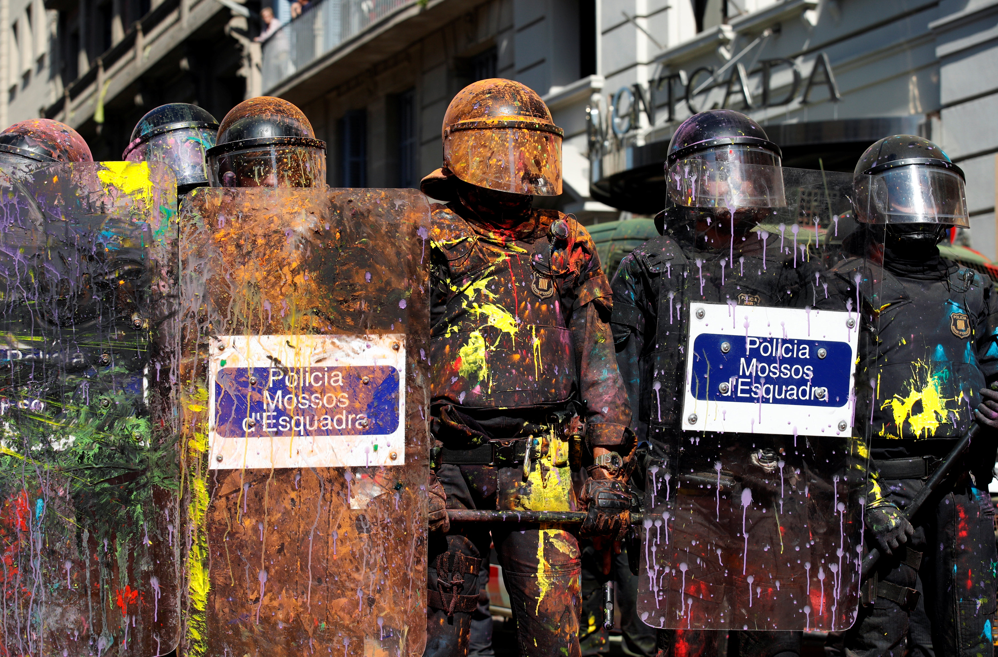  FILE: Mossos d'Esquadra police officers stand guard in front of a protest against a demonstration in support of the Spanish police units who took part in the operation to prevent the independence referendum in Catalonia on October 1, 2017, in Barcelona .  Photo: REUTERS