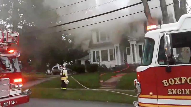 Firefighters work near a building emitting smoke after explosions in North Andover, Massachusetts, United States in this September 13, 2018 still image from social media video footage by Boston Sparks. Photo: Boston Sparks/Social Media/via Reuters