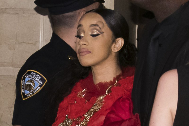 Cardi B, with a bump on her forehead, leaves after an altercation at the Harperu2019s BAZAAR u201cICONS by Carine Roitfeldu201d party at The Plaza on Friday, Sept. 7, 2018, New York. Photo: AP