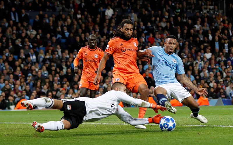 Manchester City's Gabriel Jesus in action with Lyon's Anthony Lopes and Jason Denayer during the Champions League, Group F match between Manchester City and Olympique Lyonnais, at Etihad Stadium, in Manchester, Britain, at September 19, 2018. Photo: Reuters