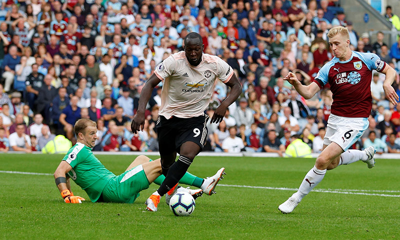 Manchester United's Romelu Lukaku in action with Burnley's Ben Mee during the Premier League match between Burnley and Manchester Unites, at Turf Moor, in Burnley, Britain, on  September 2, 2018. Photo: Reuters