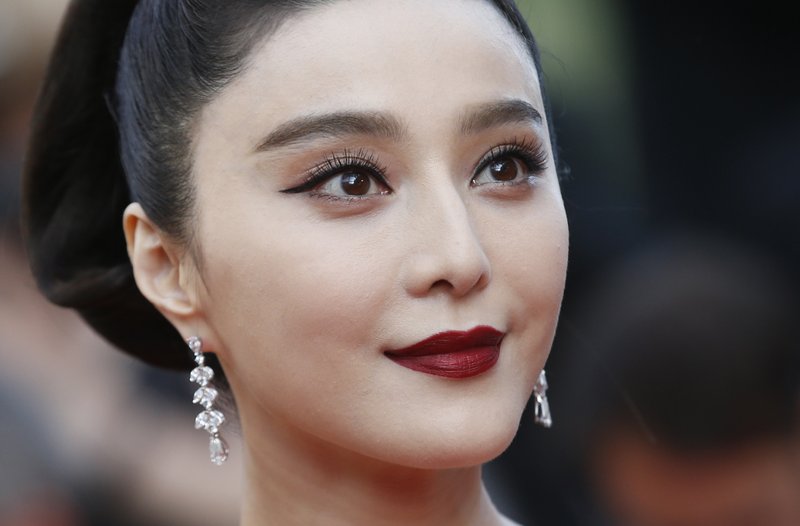 FILE - In this  photo, Fan Bingbing poses for photographers as she arrives for the screening of the film The Beguiled at the 70th international film festival, Cannes, southern France on May 24, 2017. Photo: AP