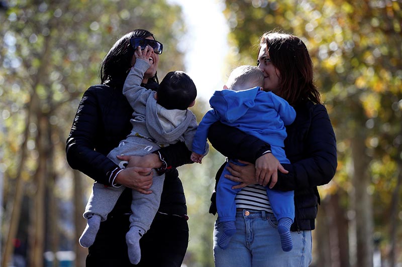 Amandine Giraud and her wife Laurene Corral pose with their children Makenzy and Leandre conceived with fertility assistance during an interview with Reuters in Paris, France, September 25, 2018. Photo: Reuters