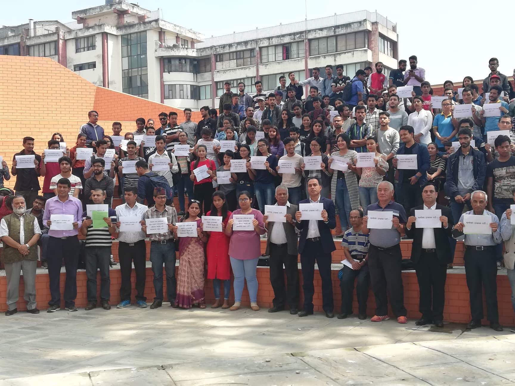 Students, scientists, culture experts and teachers hold placards in an awareness programme jointly organised by Nepal Forum of Science Journalists, Nepal Astronomical Society, Nepal Chemical Society and Nepal Mathematical Society to mark the sixth National Science Day at Kamaladi, Kathmandu, on Monday, September 17, 2018.  The programme urged the government to increase investment in science and technology. Photo: THT