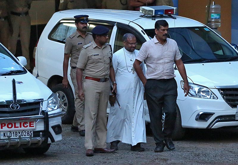 Bishop Franco Mulakkal (2nd R), accused of raping a nun, is pictured outside a crime branch office on the outskirts of Kochi in the southern state of Kerala, India, September 19, 2018. Picture taken September 19, 2018. Photo: Reuters