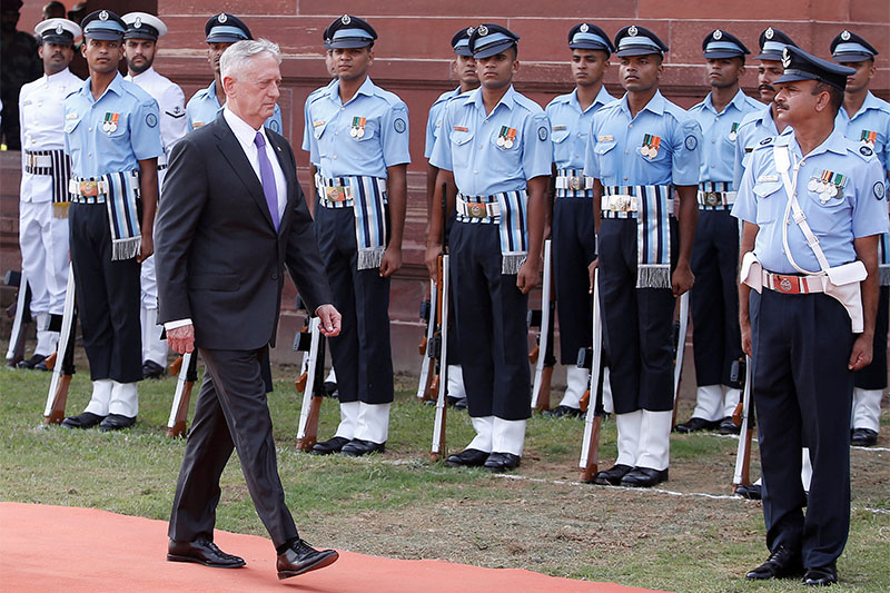 FILE PHOTO: US Defense Secretary Jim Mattis inspects an honour guard in New Delhi, India September 26, 2017. Photo: Reuters